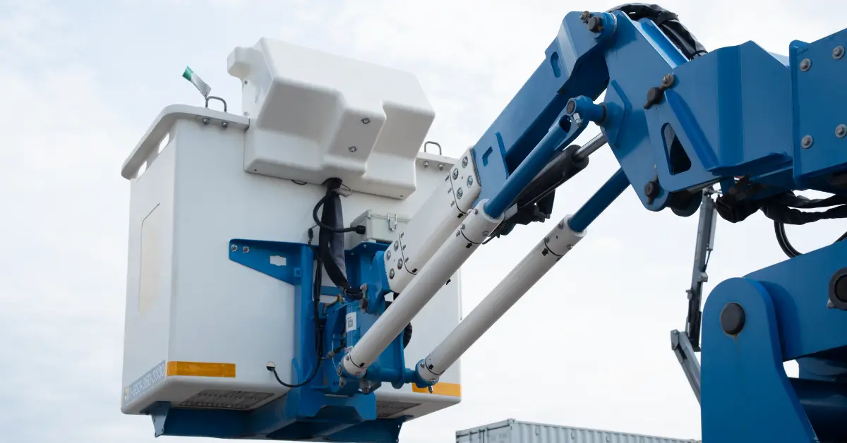 articulated boom lift insulated genie z-45-xc 45-feet basket rear view 1200x628